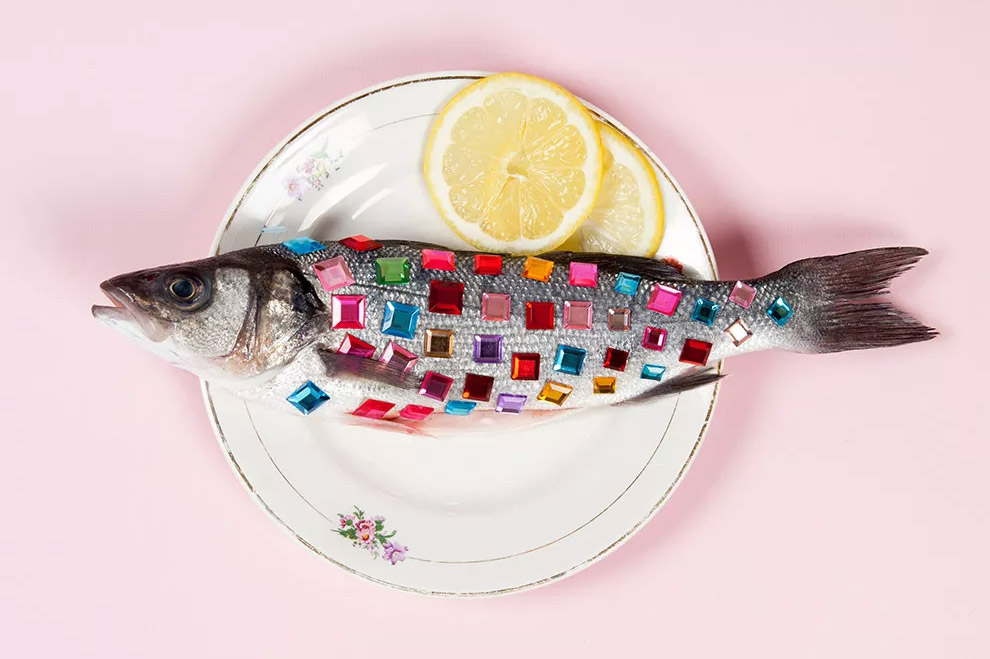 A jewelled fish on a plate symbolising good omega 3 fats