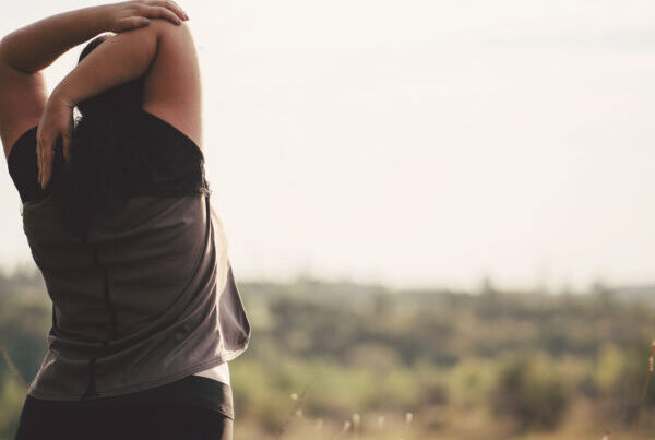 Woman stretching outdoors
